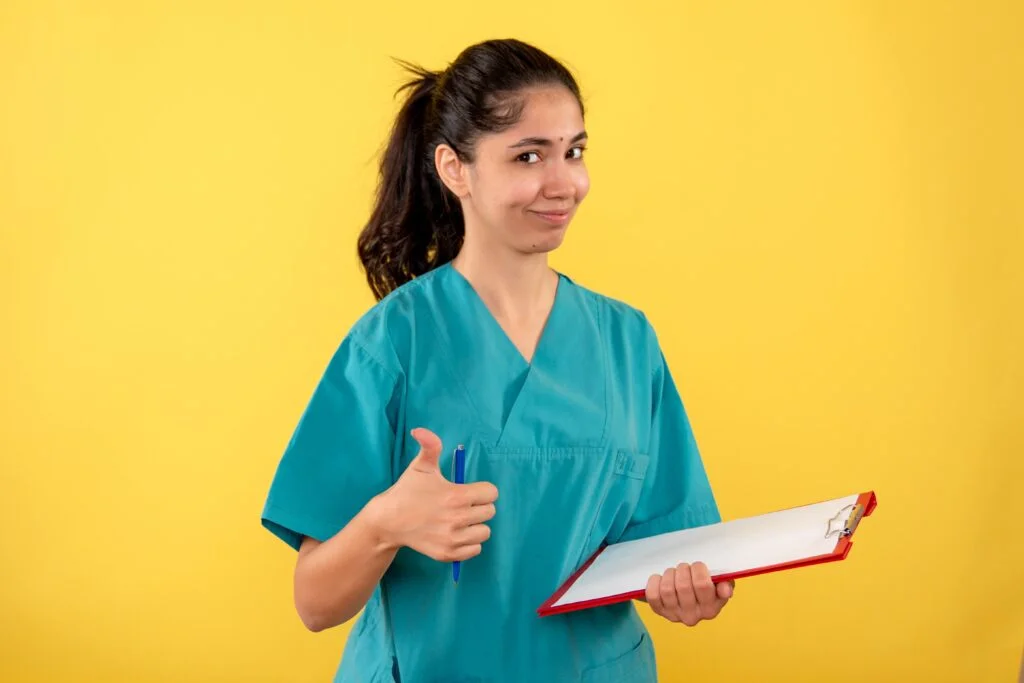 front-view-young-female-holding-clipboard-making-thumb-up-